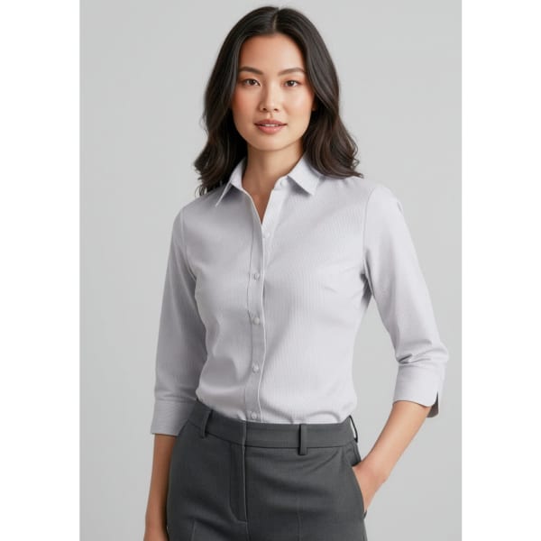 A light grey women's button-up shirt with 3/4 sleeves, featuring a collar and a fitted design.