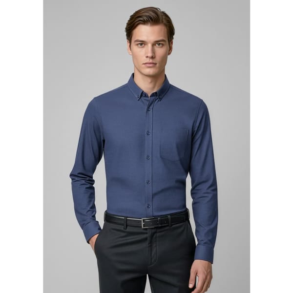 A long sleeve button-up shirt in navy blue, featuring a chest pocket and a logo on the front.
