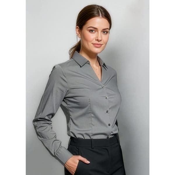 A grey women's long sleeve button-up shirt with a fitted silhouette, featuring a collar and buttons.