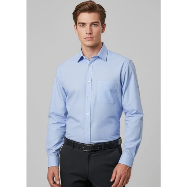 A light blue long sleeve button-up shirt with a chest pocket and a branding logo.