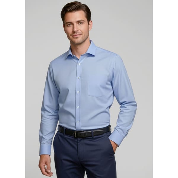 A light blue long sleeve button-up shirt with a single chest pocket, worn by a male model.