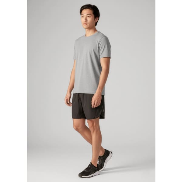 Men's tactic shorts in black, paired with a grey t-shirt. The shorts feature a logo and are designed for sports activities.