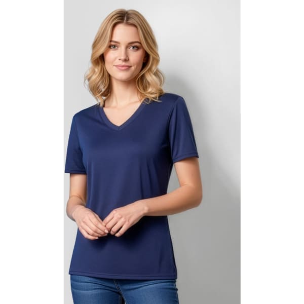 A woman models a navy blue short sleeve tee with a V-neck. The shirt features a logo on the design.