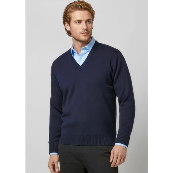 A navy woolmix knit pullover with a V-neck design, modelled by a man in a light blue shirt underneath.