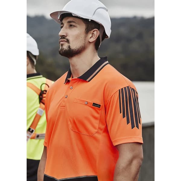 An orange short-sleeve polo shirt featuring black detailing and a logo, suitable for workwear.