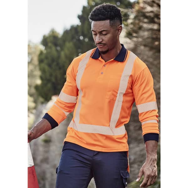 A long sleeve polo shirt in high-visibility orange, featuring segmented reflective tape and a navy collar.