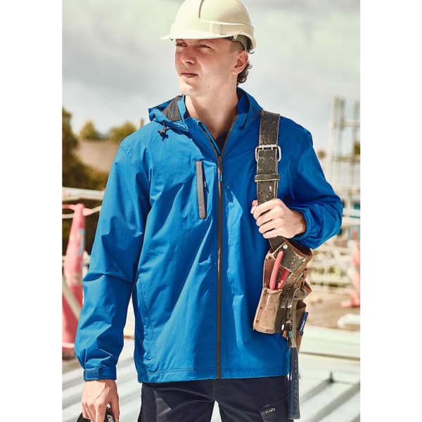 A blue unisex lightweight packable rain jacket, featuring a hood and a logo, worn by a person on a construction site.