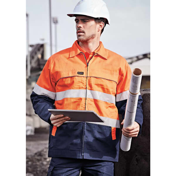 Hi-vis orange and navy cotton drill jacket, featuring reflective stripes and a logo, worn by a man holding plans.