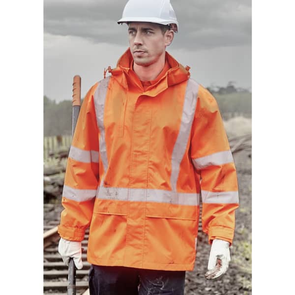 An orange waterproof jacket with reflective stripes, worn by a man in a hard hat and gloves, set against a cloudy background.