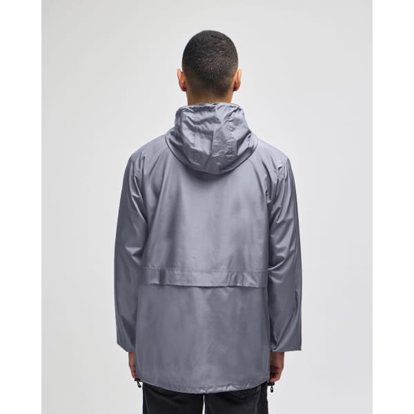 A man wearing a grey Champion Adult Full-Zip Anorak Jacket with a hood, viewed from the back.