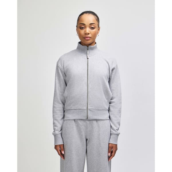 A grey full-zip jacket with a stand collar, featuring a fitted design and long sleeves. Contains a logo.