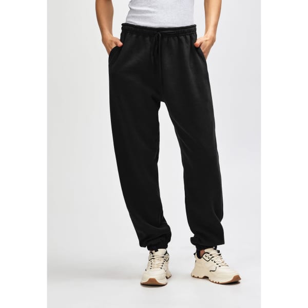Black unisex sweatpants with an elastic waistband and drawstring, featuring a logo on the side.