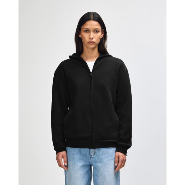 A black unisex full zip hooded sweatshirt displayed on a model. The garment features a logo.