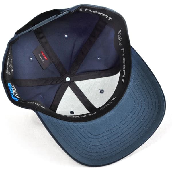 A navy blue cap featuring a branded interior and a traditional structured design.
