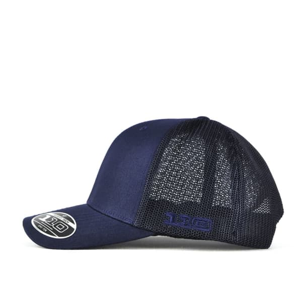 A navy blue trucker cap with a mesh back, featuring a logo on the side.
