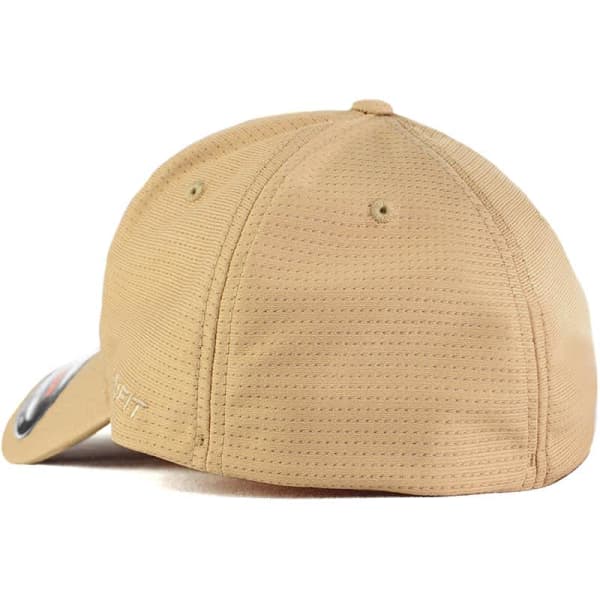 A beige FLEXFIT cap featuring a textured design and a logo on the side.