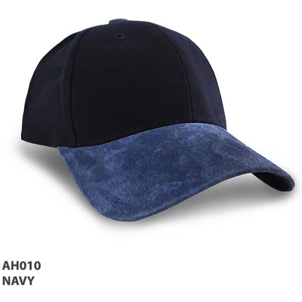 A navy cap with a suede peak, featuring a curved brim and a branding logo on the front.