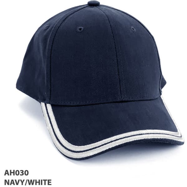 A navy and white cap featuring double piping details and a prominent logo on the front.