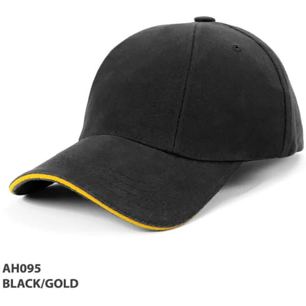 A black cap with gold detailing along the brim, featuring a logo on the front.