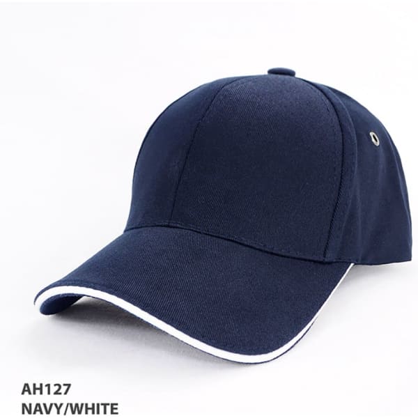 A navy and white organic cotton sandwich cap with a curved brim and logo detail.