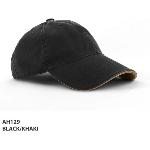 A black and khaki enzyme washed cap with a curved brim and an adjustable back. Features a simple logo on the side.