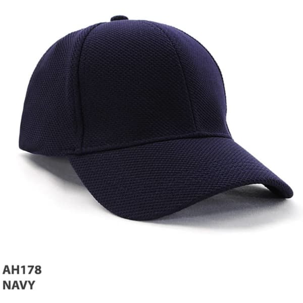 A navy fitted cap with a structured design, featuring a logo on the front and a textured mesh material.