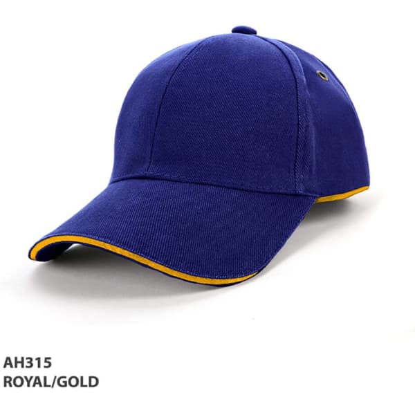 A royal blue cap with gold piping and a logo on the side, designed for headwear.