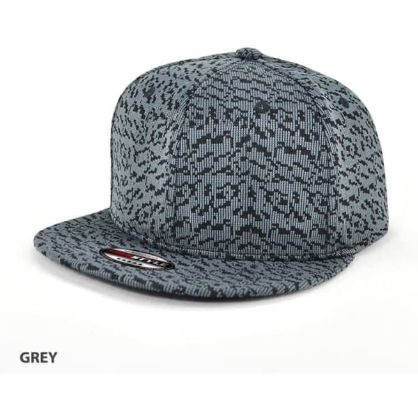 A grey cap featuring a textured pattern, with a flat brim and branding on the side.