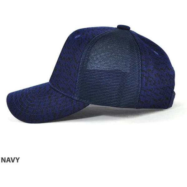 A navy cap with a textured pattern and mesh back, featuring a logo on the side.