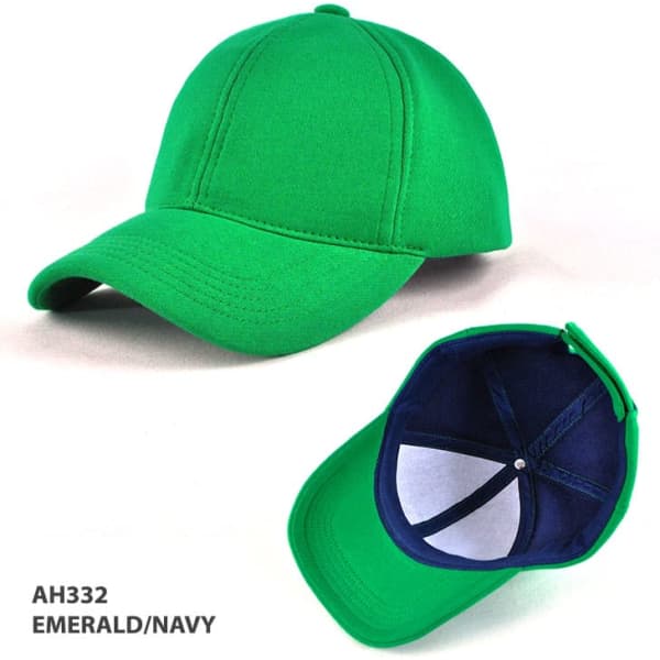 A green cap with a navy interior and a logo. It features a curved brim and a structured crown.