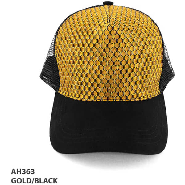 A gold and black trucker cap featuring a patterned design and a logo.
