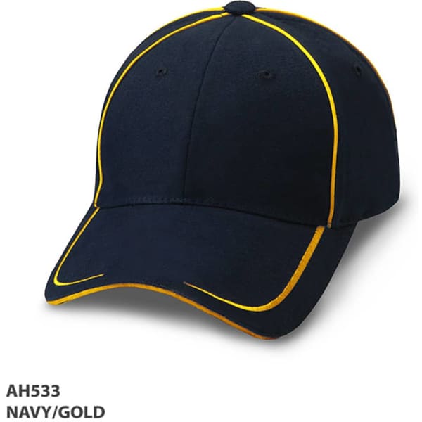 A navy cap with gold accents and a logo, featuring a curved peak and stitching details.
