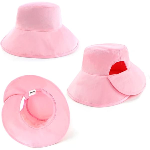 A pink bucket hat featuring a wide brim and a logo, with an open design showing the interior.