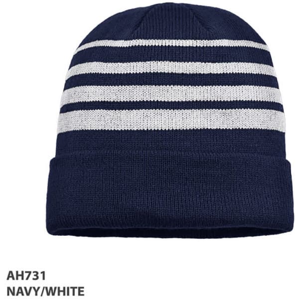 Acrylic beanie in navy and white stripes, featuring a folded hem and a logo.