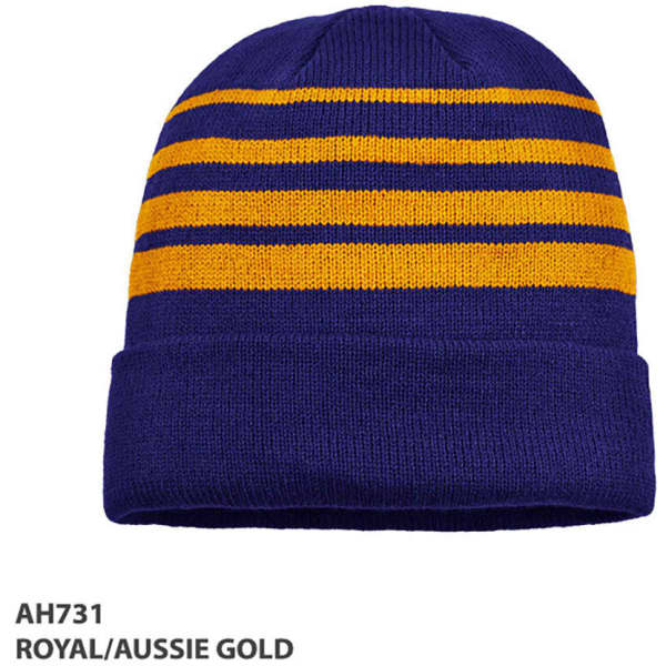 Acrylic beanie in royal blue and gold with horizontal stripes and a folded cuff. Includes a logo.