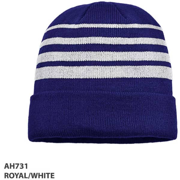 Acrylic beanie in royal blue with white stripes, featuring a cuffed design and a logo.