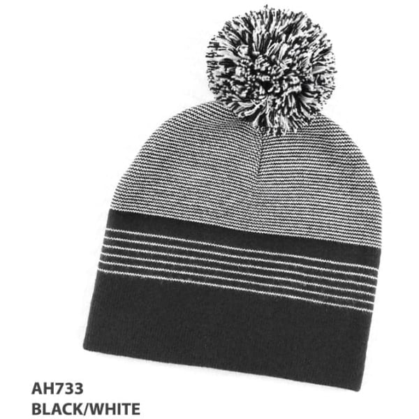A knitted black and white beanie with a pom-pom on top and horizontal stripe detailing. It features a logo.
