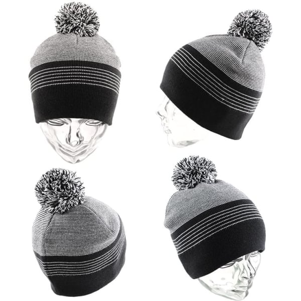 A beanie in black and grey with a pom-pom on top, featuring horizontal stripes and a logo.