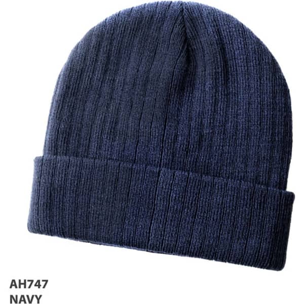 A navy wool blend beanie with a ribbed texture and a folded cuff. It features a logo.