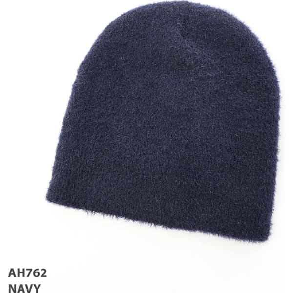 A navy blue shaggy beanie with a soft texture, featuring a logo.