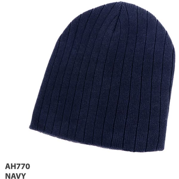 A navy 100% cotton beanie with a ribbed texture, featuring a small logo.