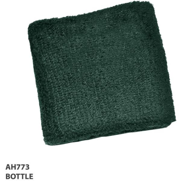 A green wrist band made of textured material, featuring a logo.