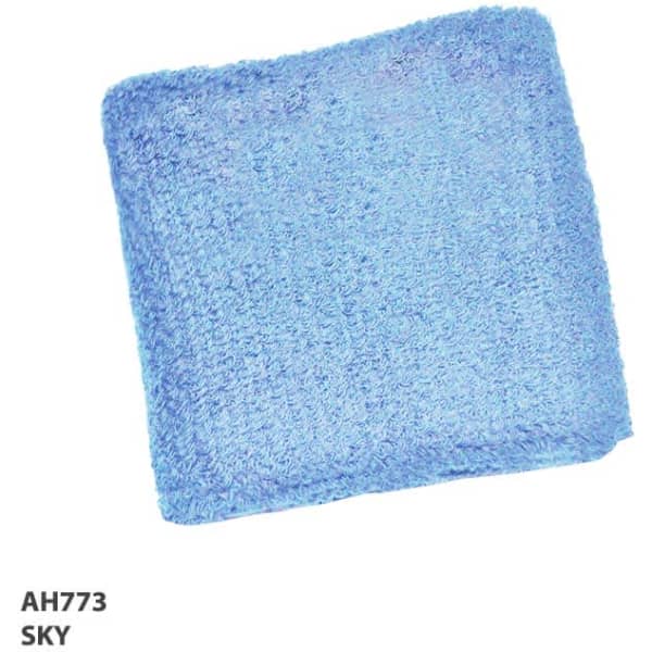 A light blue wrist band made of soft, textured material. It features a logo on one side.