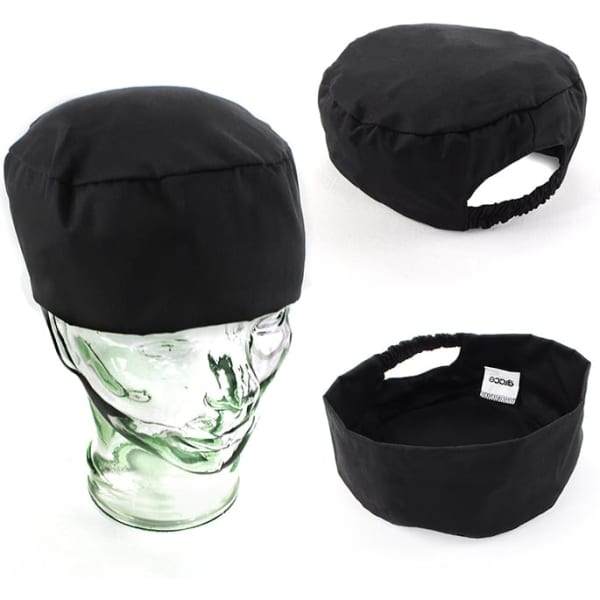 A black polycotton chef's hat displayed from multiple angles on a model head. It features an elastic back and branding.