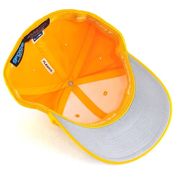A cap featuring a bright yellow crown and a silver peak, with the interior lining in orange and a logo visible.