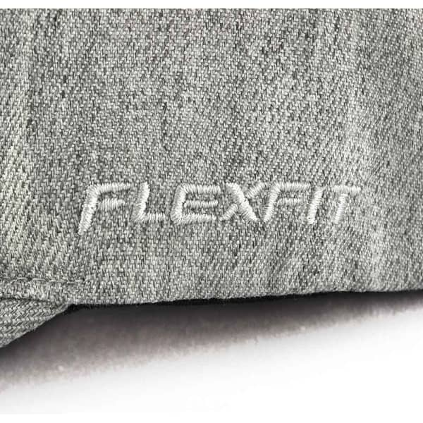 A grey cap featuring the "FLEXFIT" logo, showcasing a textured fabric design.