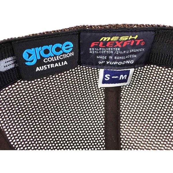 A brown FLEXFIT trucker cap with a mesh back and an interior label indicating size and material composition.