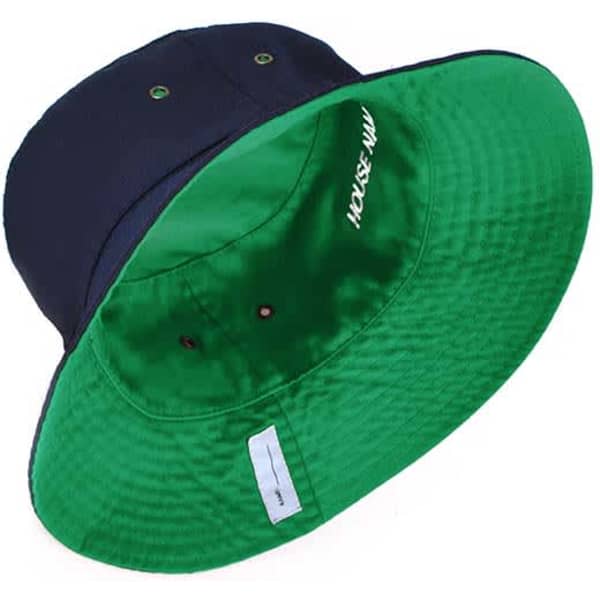 A reversible bucket hat with a navy exterior and a green interior, featuring a logo inside.