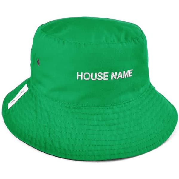 A green reversible bucket hat with a logo on the side and a simple design.