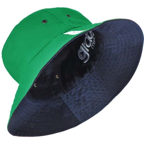 A reversible bucket hat featuring green on one side and black on the other, with a logo inside.